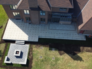 Raised Patio by RIVERMIST using Techo-Bloc product Blu Grande