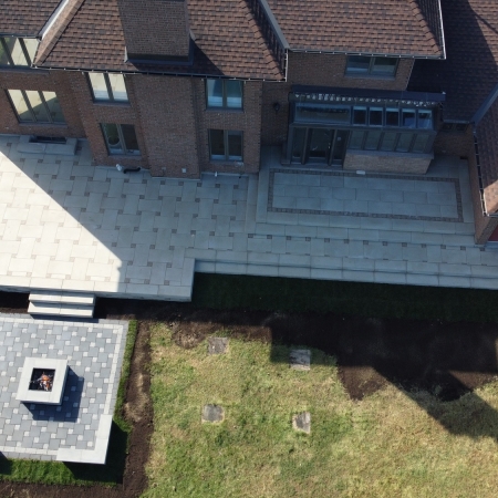 Raised Patio by RIVERMIST using Techo-Bloc product Blu Grande